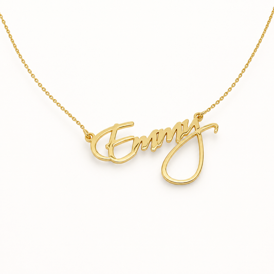 Gold-tone personalized name necklace with a script pendant.