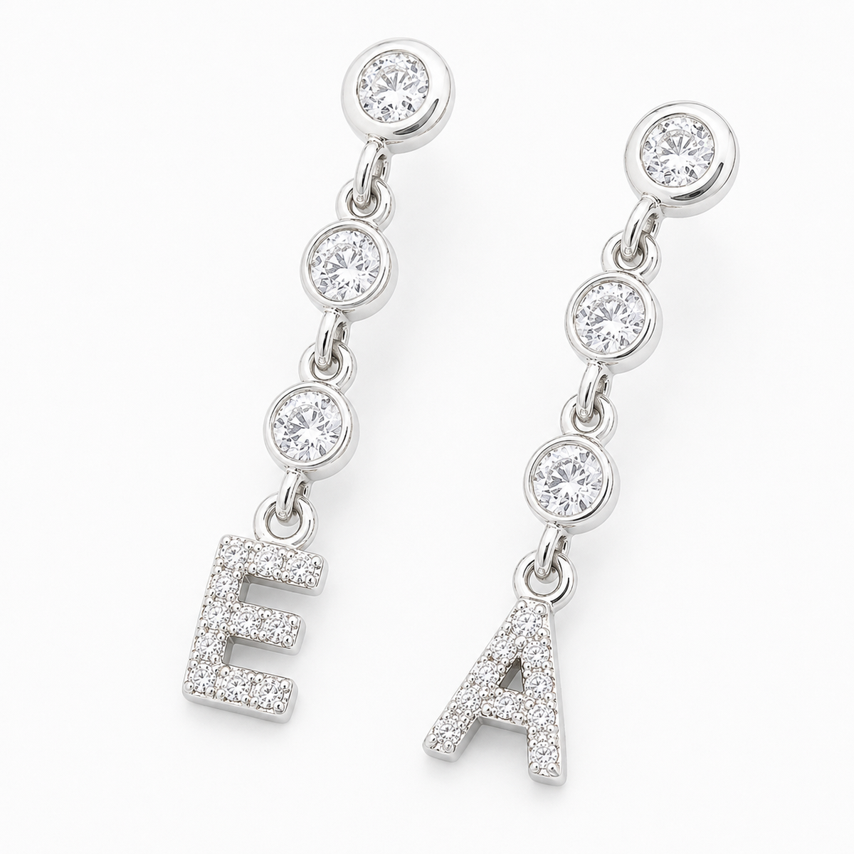 Gold-tone initial dangle earrings with sparkling CZ details.