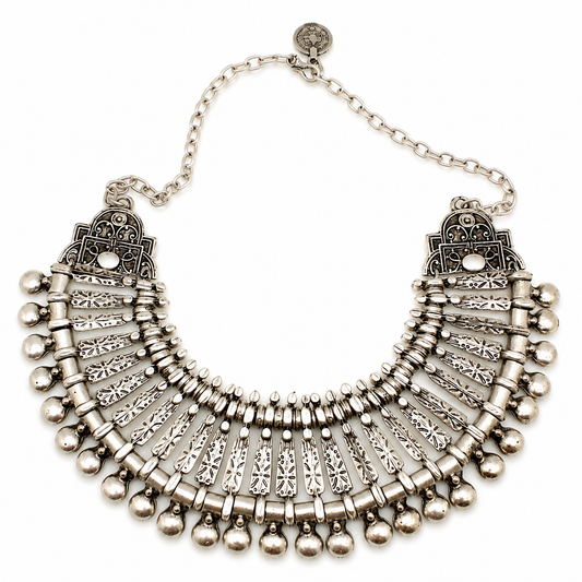 Silver-tone boho fan collar necklace with ornate detailing and a sculptural silhouette.