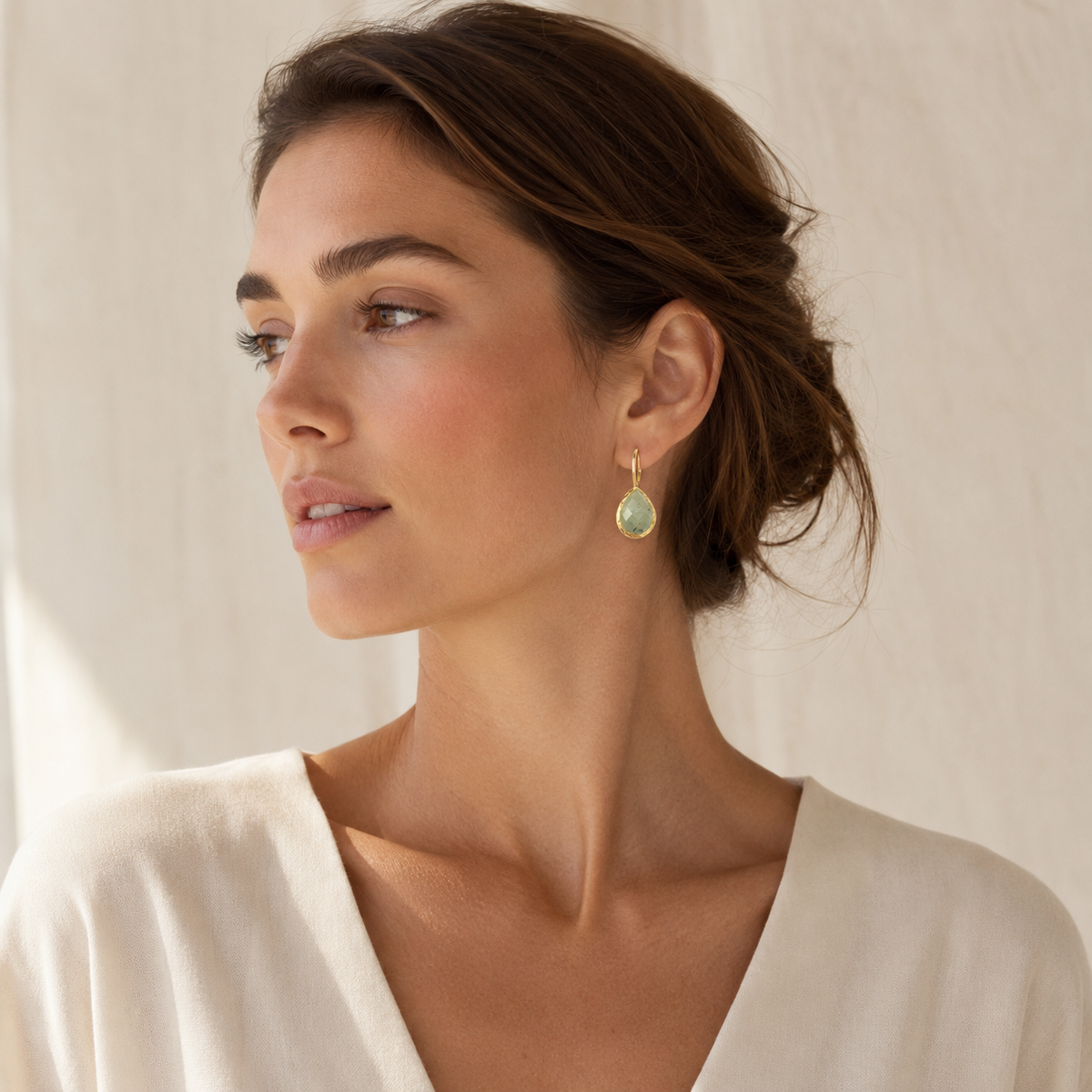 Faceted aventurine teardrop earrings with a warm gold finish.