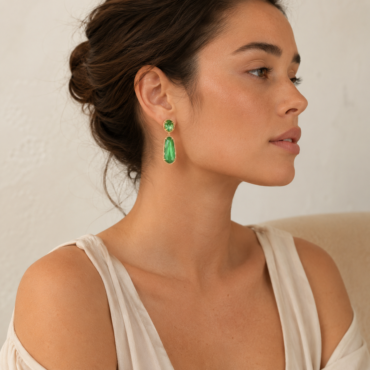 Pair of green statement earrings with a luminous gold-plated finish.
