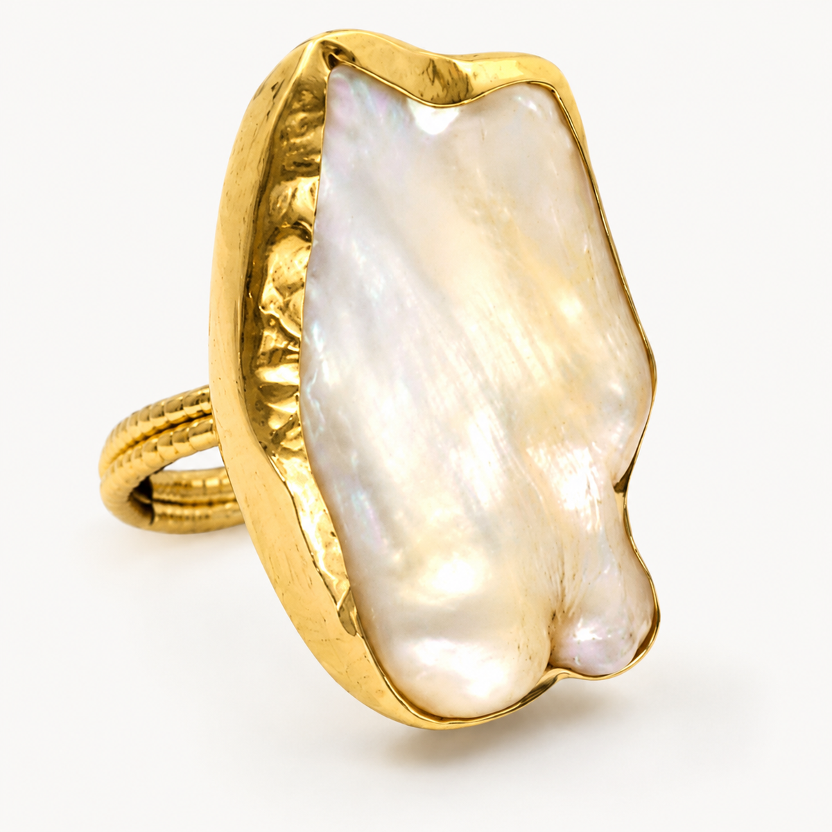 Close view of the mother of pearl center and gold-plated edge.
