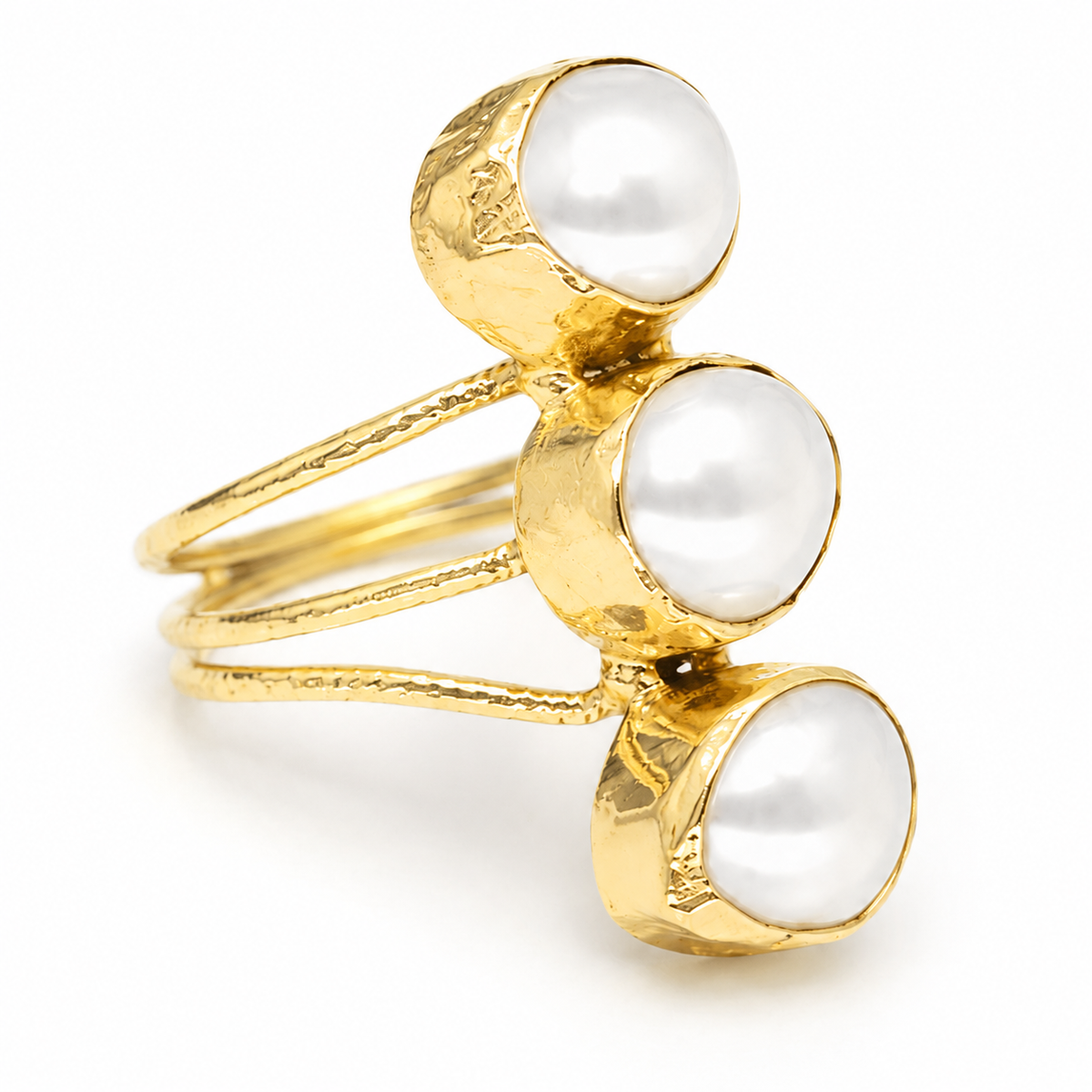 Close-up of the pearl-like accents and gold-plated setting.