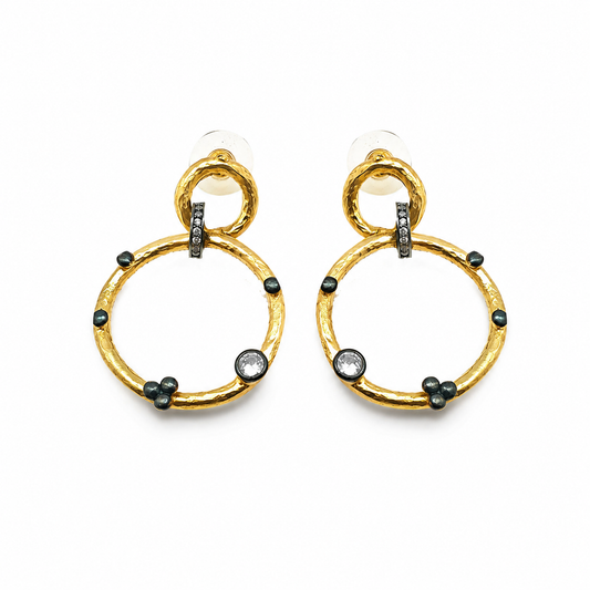 Gold-plated double circle dangle earrings with dark accent details.