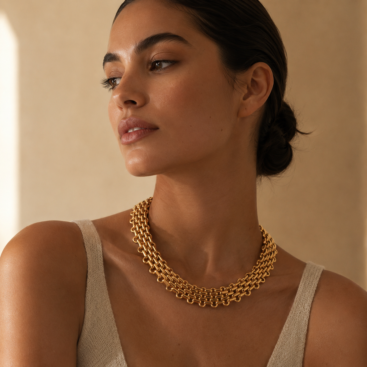 Minimalist flat chain necklace with a polished gold-tone finish.