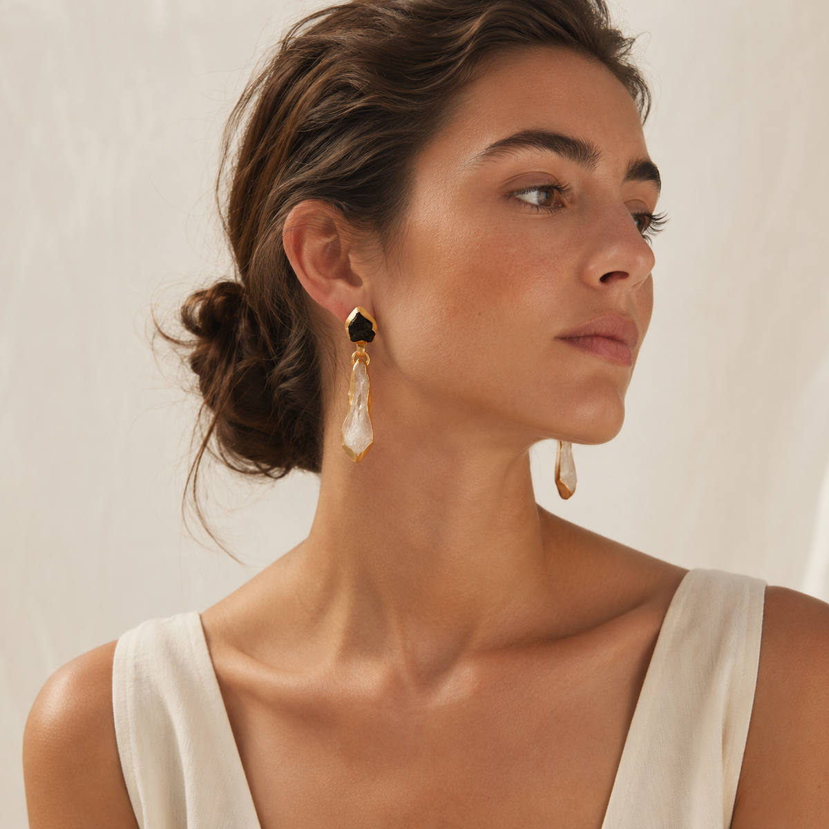 Gold-plated earrings with a bold drop silhouette.