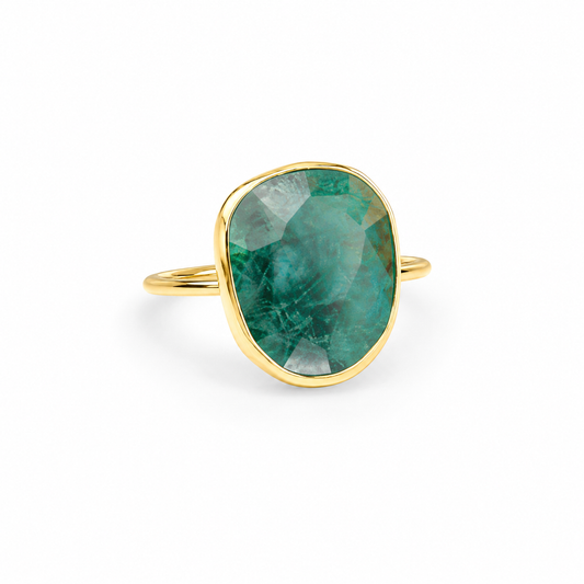 Emerald green oval statement ring with a gold-plated frame.