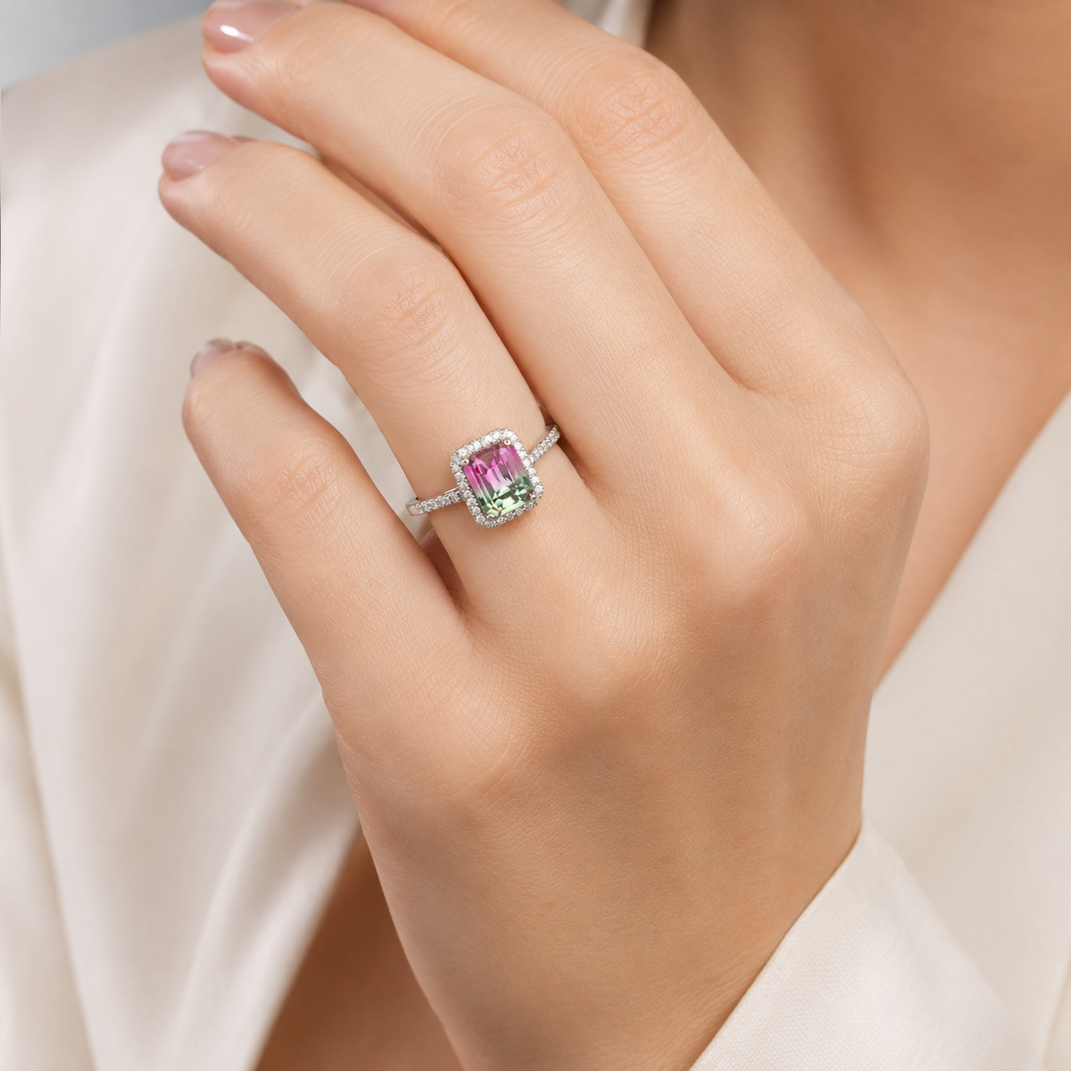 Silver-tone ring with a purple stone and sparkling halo setting.