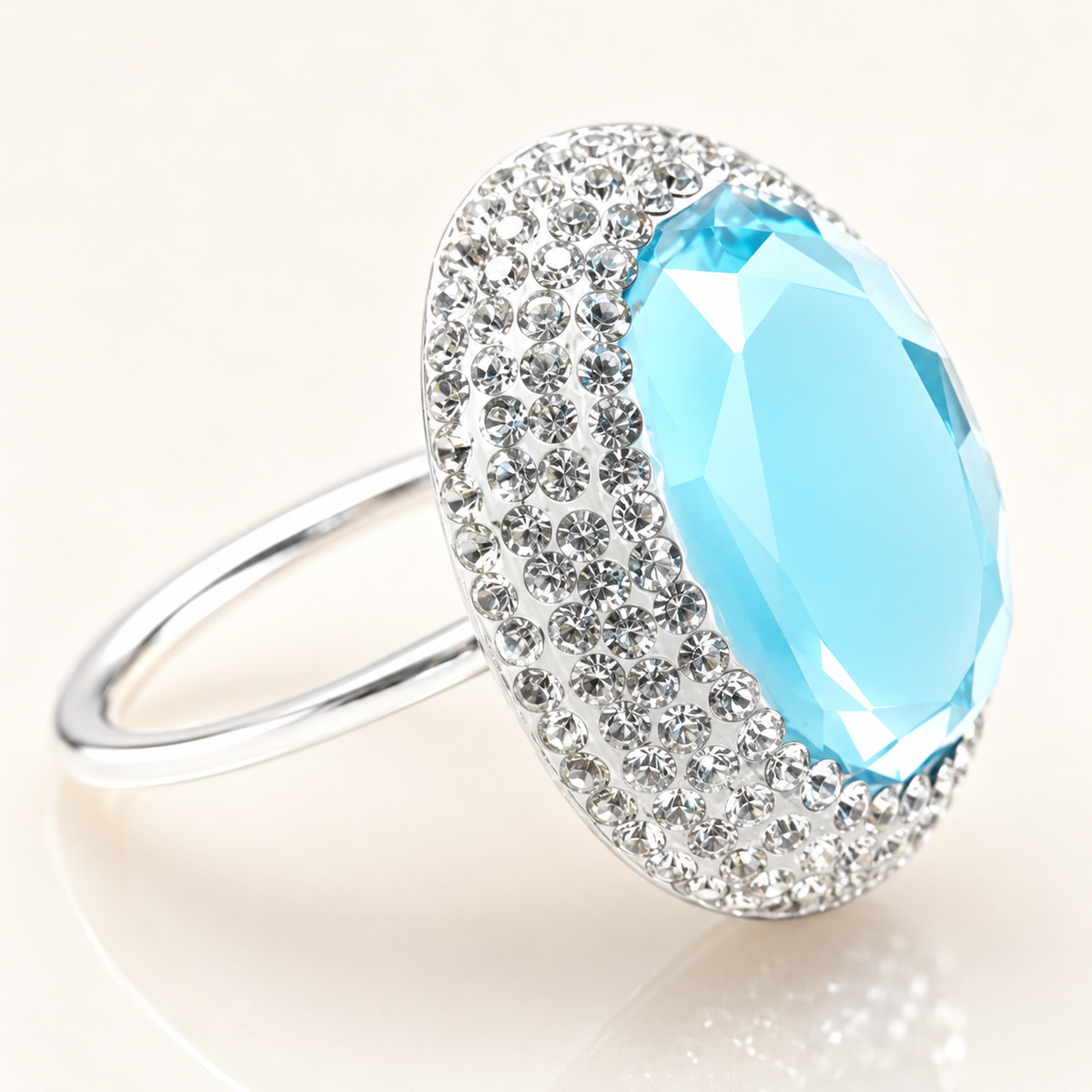 Close view of the baby blue stone and textured trim on the ring.