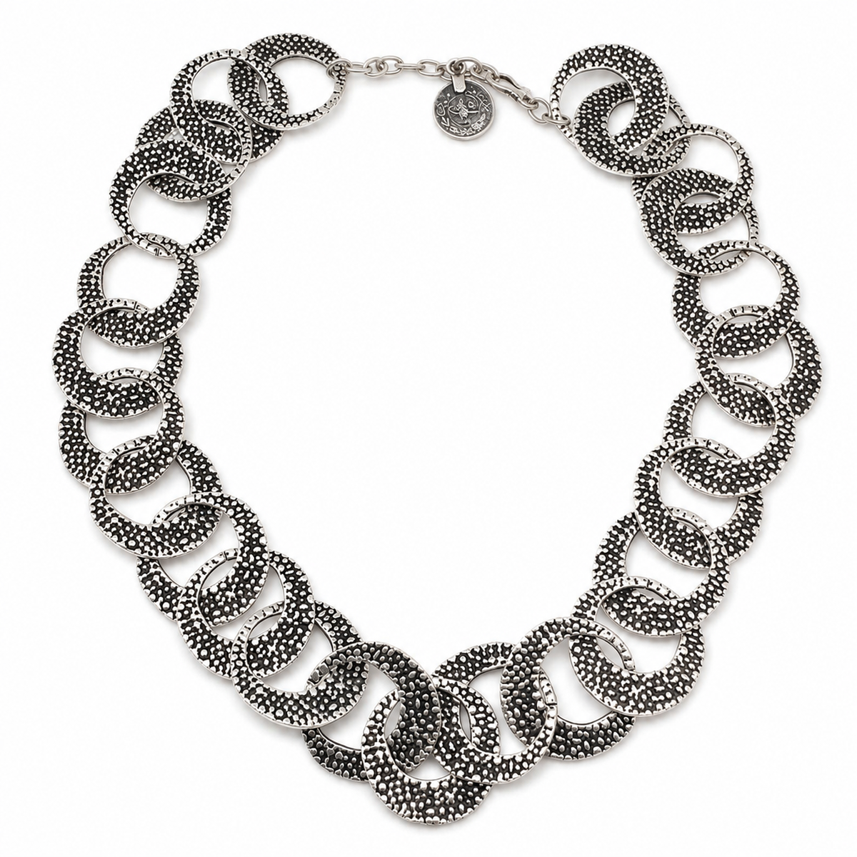 Textured silver oval link necklace with a bold layered silhouette.