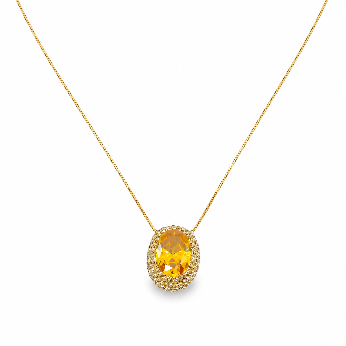 Gold-tone necklace with an oval citrine pendant on a white background.