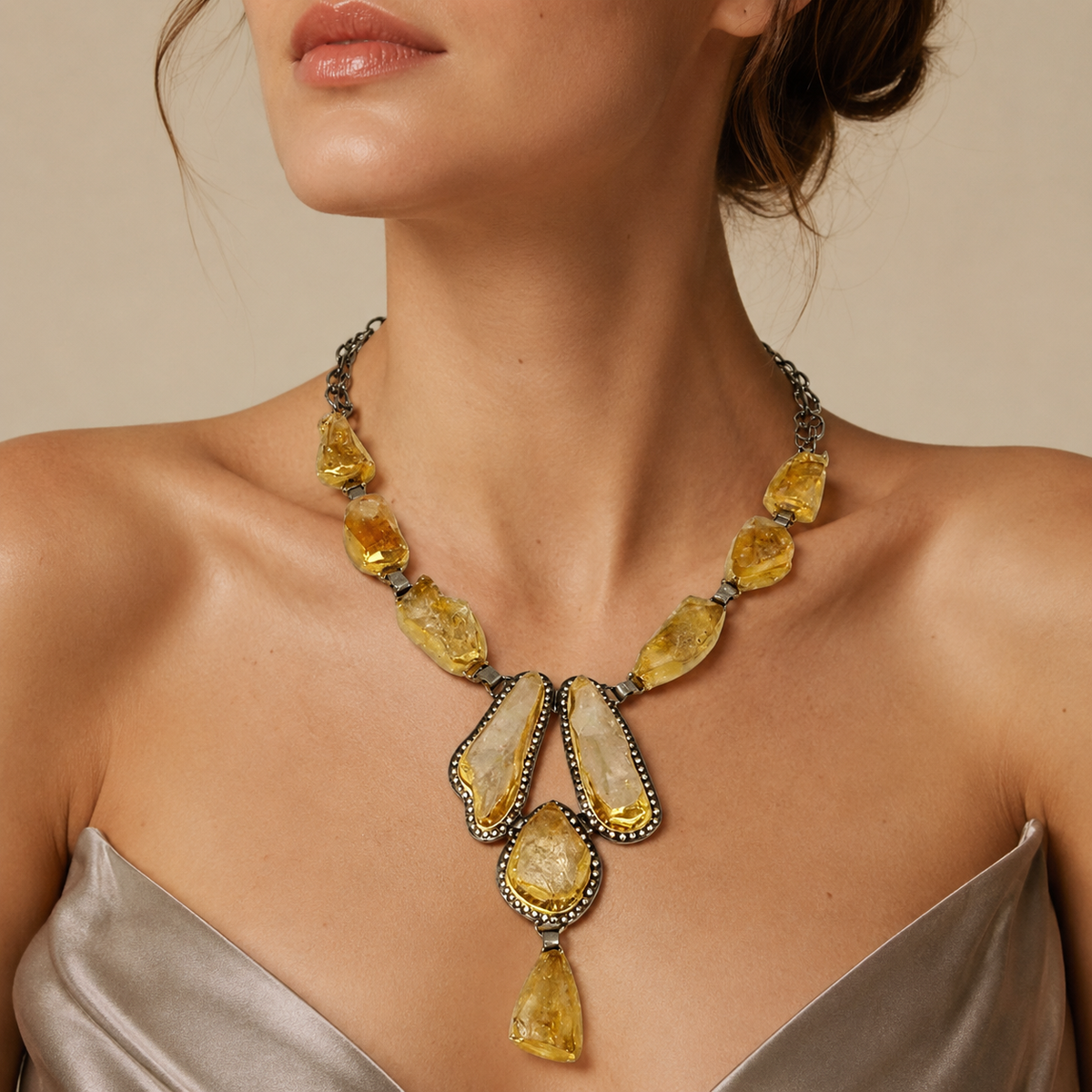 Citrine raw crystal Y necklace shown on a white background.