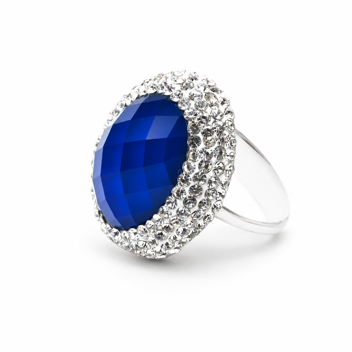 Emerald-cut blue stone ring with a sparkling clear accent frame and slim band.