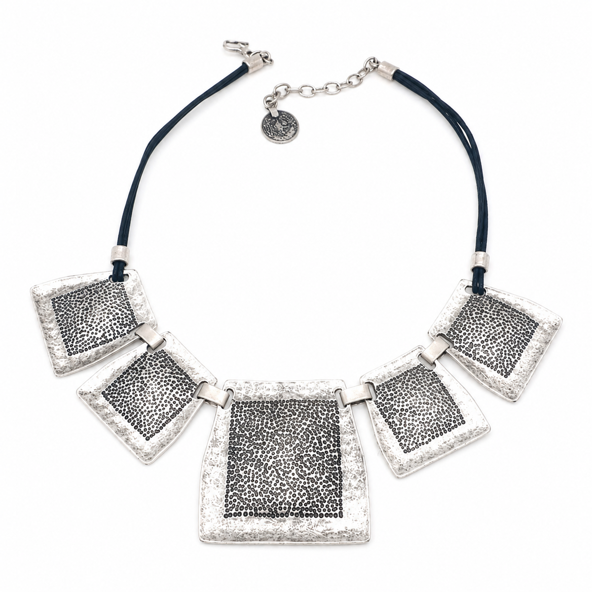 Textured square plate necklace with a silver-tone finish and dark contrast detail.