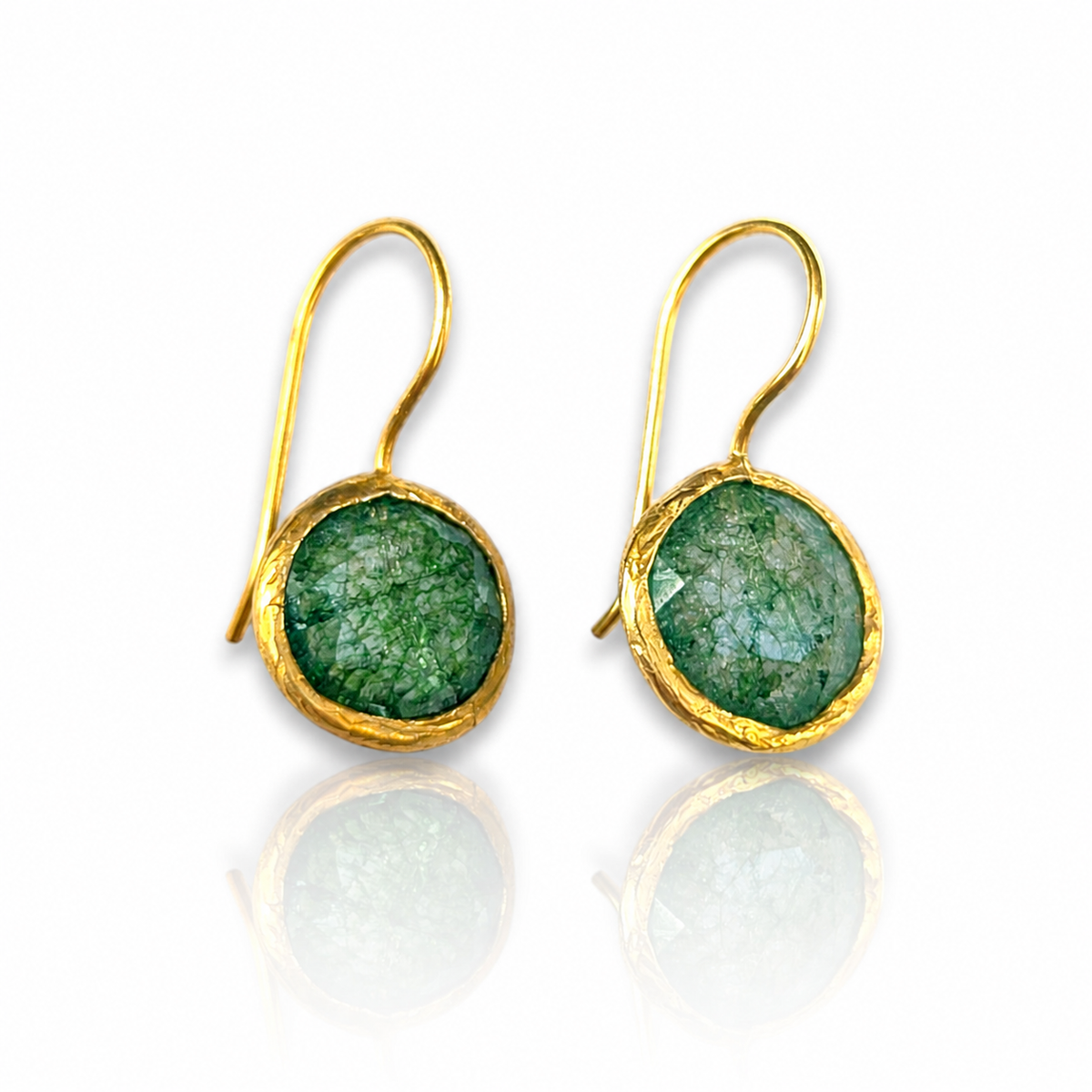 Gold-plated drop earrings with round green stones.
