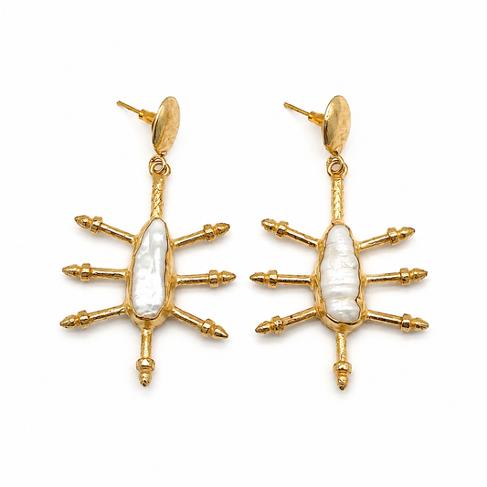 Pair of gold-plated hook earrings with a cushion-shaped blue sapphire look and a graceful drop silhouette.