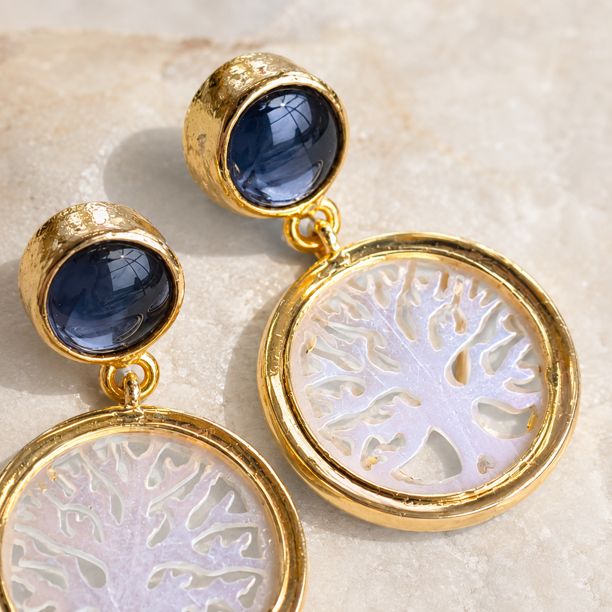 Close view of the black onyx top and Tree of Life pendant.