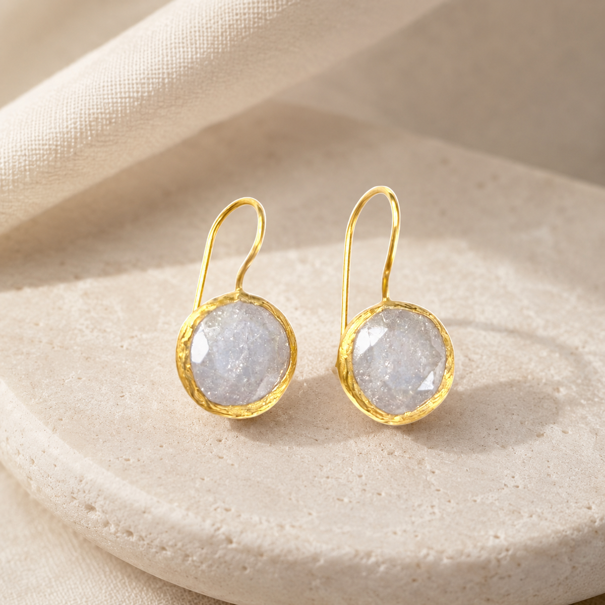 Round clear CZ gold-plated drop earrings with a polished finish.