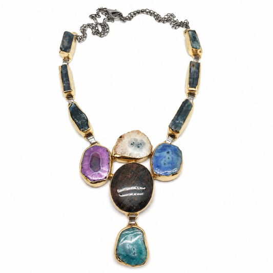 Multi stone agate statement necklace with colorful stone pendants and a gold-tone setting.