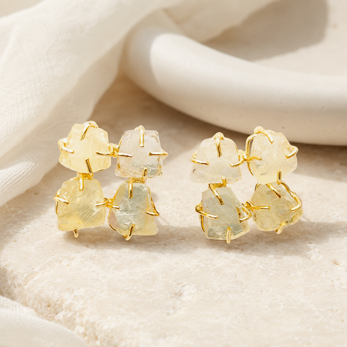 Gold plated rough citrine stud earrings with a softly irregular silhouette.