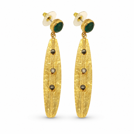 Pair of gold-plated drop earrings with olive green stone accents and a long textured gold drop.